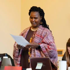 A student gives a presentation during class